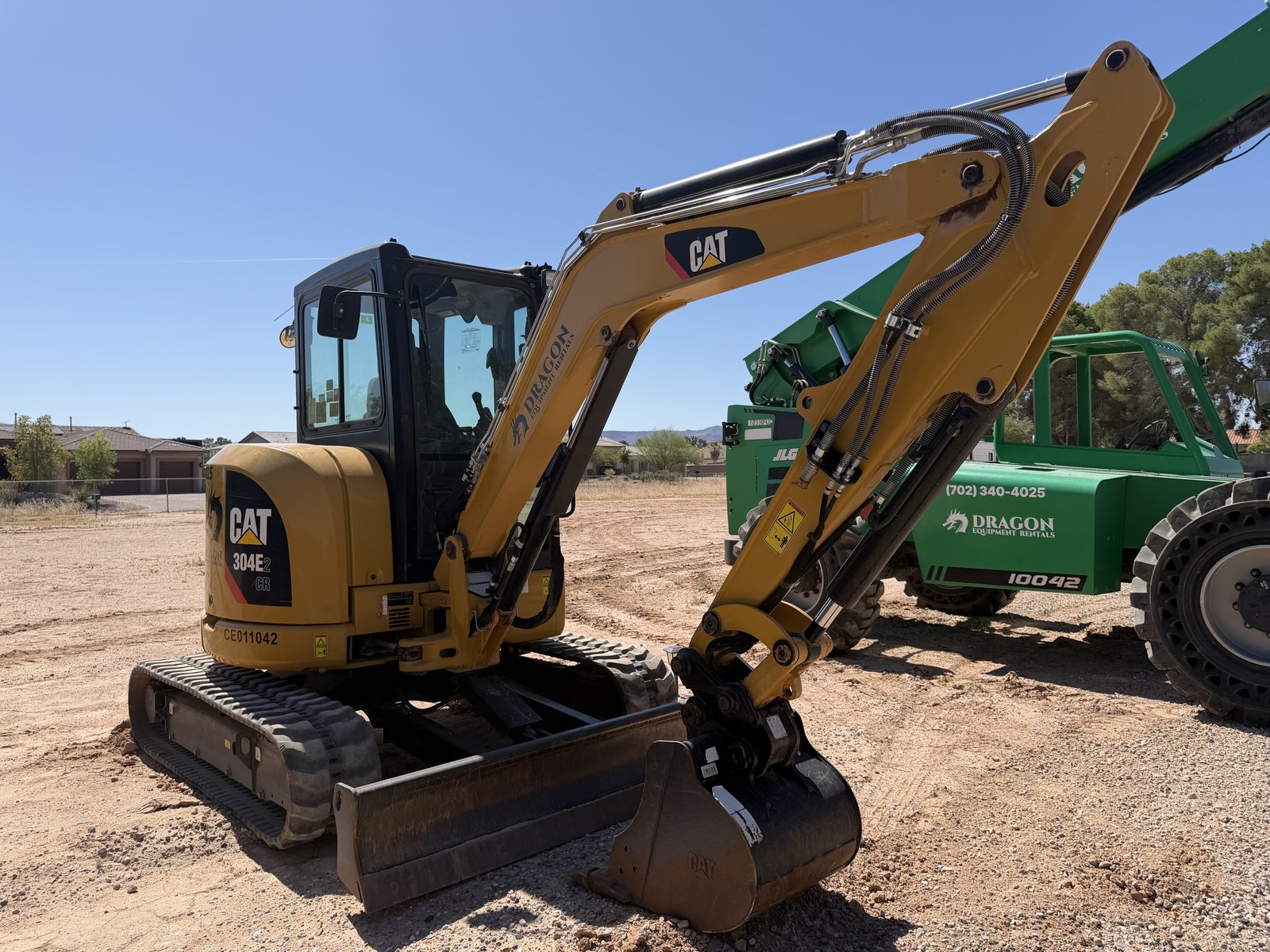 CAT 304E2 Mini Excavator with Dragon Equipment Rentals branding, Las Vegas
